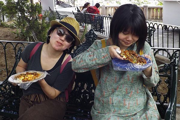 eating street food when traveling