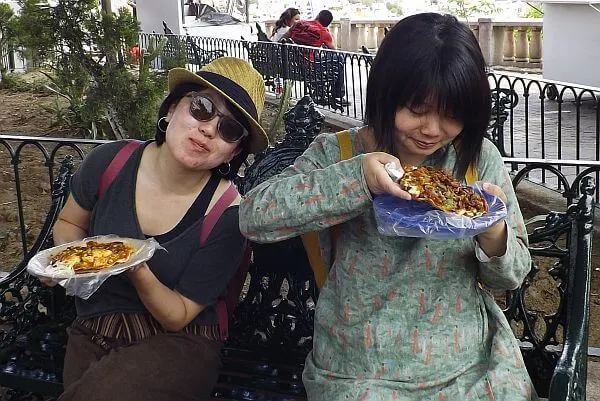 eating street food when traveling
