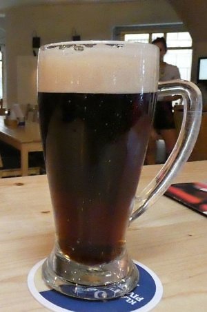 A delicious microbrew pint in the Old Town tourist district in Prague Czech Republic 