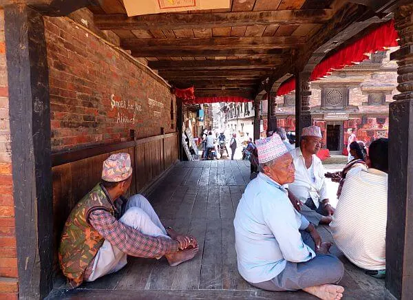 men in the shade in UNESCO Bhaktapur