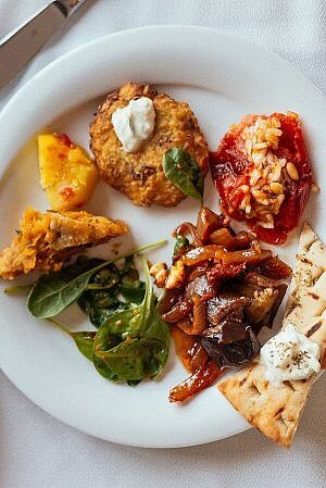Sampling Greek food on an Athens local tour