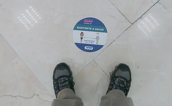 Cancun airport distancing marker on floor